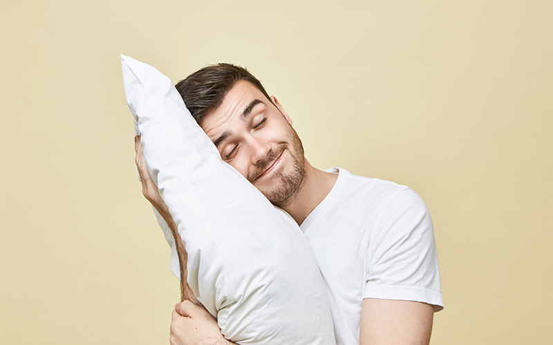 Man smiling in sleep